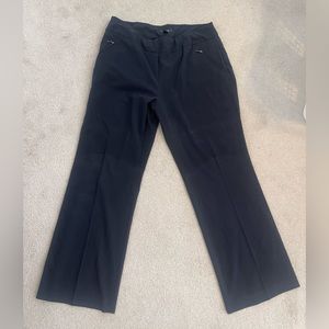 Dress pants. Stretchy. Zippers on side for pockets.